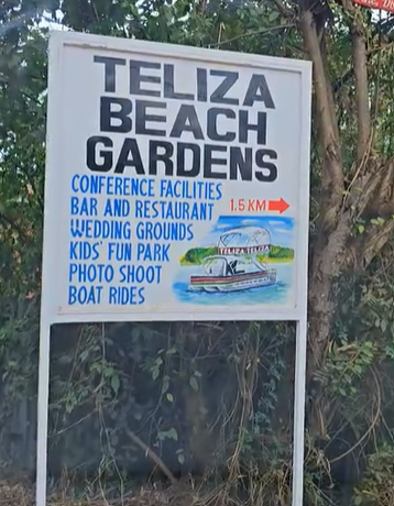 Directional board to Teliza Beach Gardens